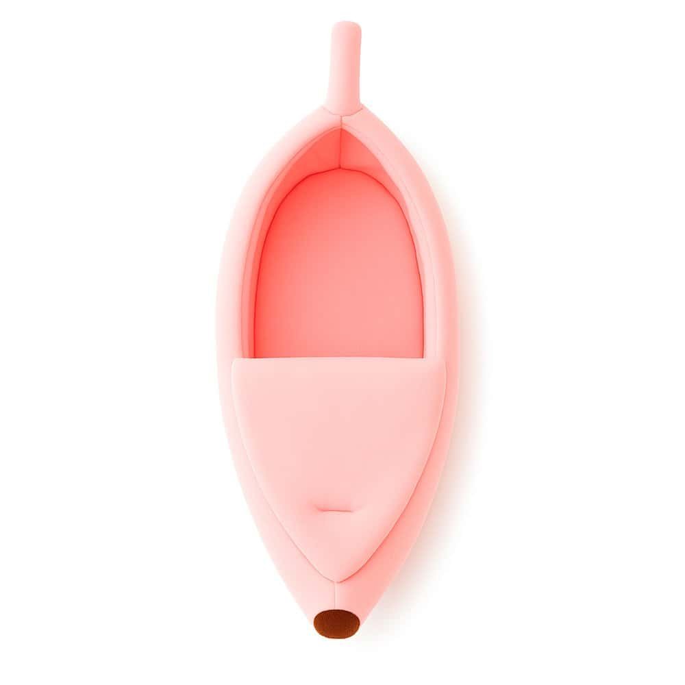 High-resolution top view of a banana-shaped plush pet bed for kittens on white background