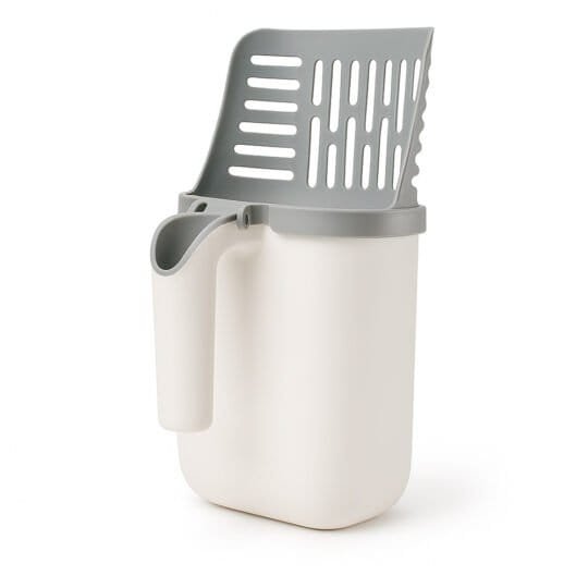 Integrated cat litter scoop with attached waste bin on white background